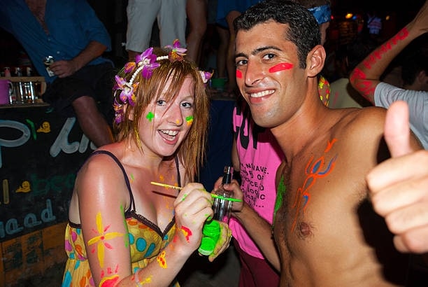 Paint your body with neon paint and join the party