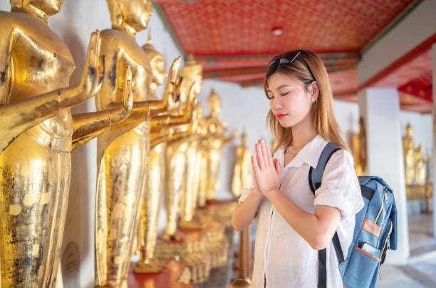 Keep quiet and showing reverence inside the temple