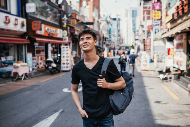 Millennial Korean guy exploring the city