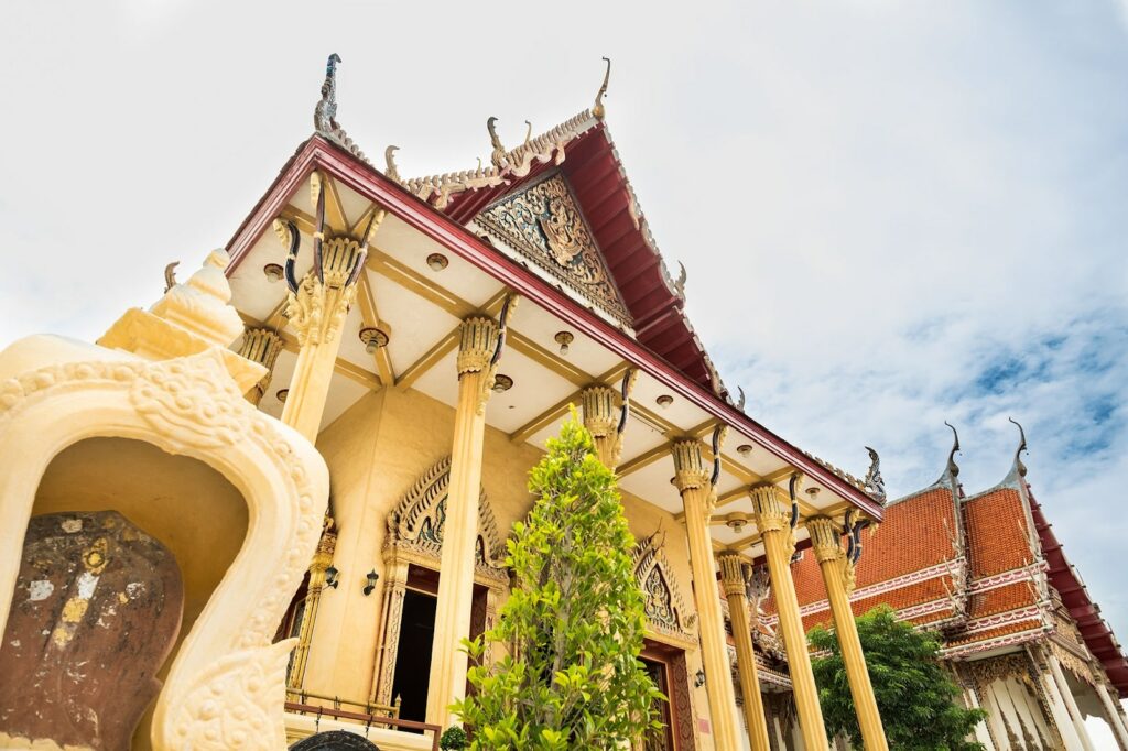 Pay respects at Wat Charoen Sukharam Worawihan